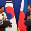 [서울포토] 마주보고 웃는 문재인 대통령과 두테르테 필리핀 대통령