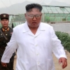 비 맞는 김정은 북한 국무위원장 사진 공개 ‘눈길’