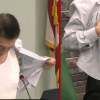 “내 애국심 보여주마” 셔츠 벗어 흉터 보여준 아시아계 미국 공직자