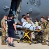“비행 중 진통” 착륙 직후 화물칸서 출산한 아프간 탈출 임신부