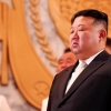 北열병식, 김정은 ‘눈시울’…신형 무인기·ICBM·핵어뢰 과시 [포착]