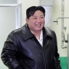 [포토] 北김정은, 가죽점퍼·확 바뀐 헤어스타일 눈길