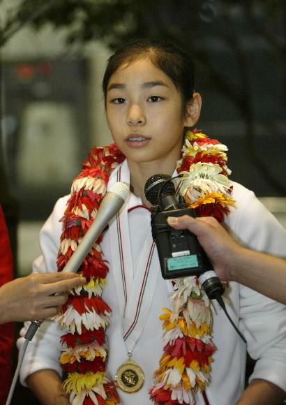 피겨 국제대회 첫 우승 김연아 귀국