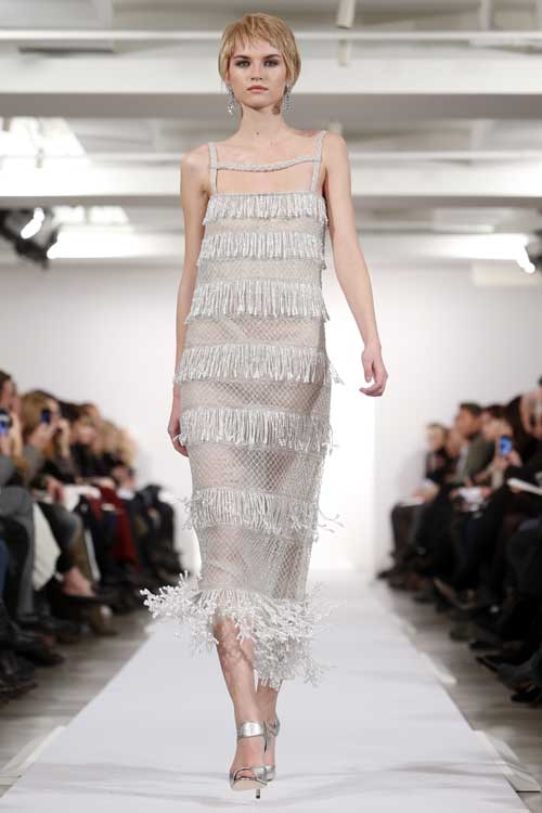 11일(현지시간) 뉴욕에서 패션 위크 동안 오스카 드 라 렌타 2014 가을 컬렉션을 모델이 선보이고 있다.<br><br>사진제공=AP/뉴시스
