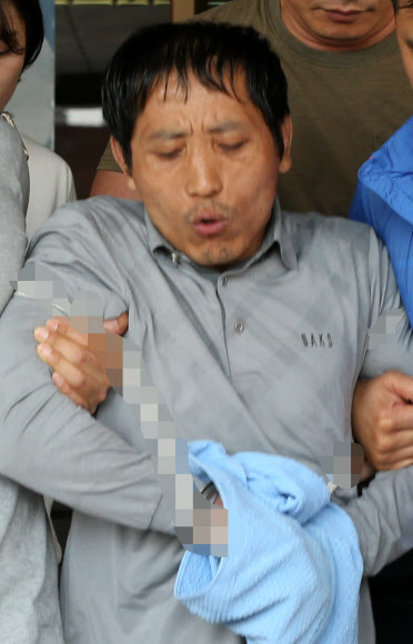 성동경찰서 떠나는 ’트렁크 시신’ 살인 용의자 김일곤