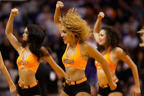 The Phoenix Suns cheerleaders perform during the second half of the NBA game against the Los Angeles Lakers at Talking Stick Resort Arena on November 16, 2015 in Phoenix, Arizona.