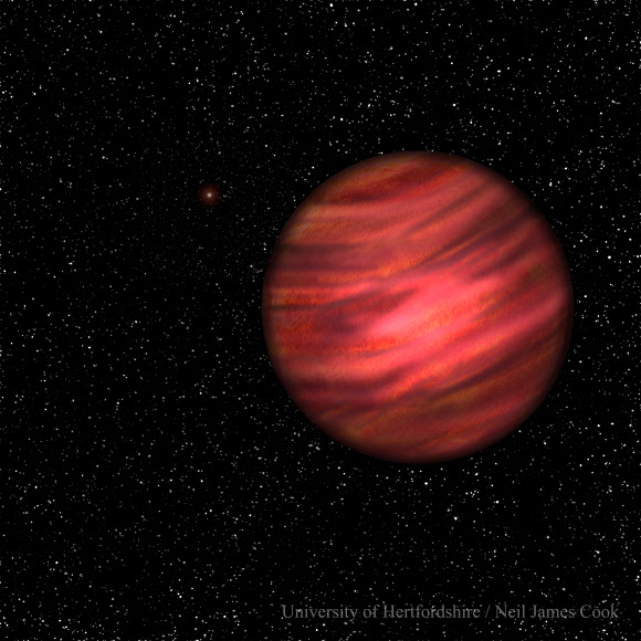 영국 왕립천문학회(RAS)는 항성 TYC 9486-927-1와 행성 2MASS J2126으로 이뤄진 태양계의 발견 소식을 27일(현지시간) 발표했다. 이들은 지금껏 알려진 가장 멀리 떨어진 항성-행성 조합보다 3배가량 더 떨어져 있다. 항성과 행성의 거리는 1조㎞, 행성이 궤도를 도는 데 90만년이 걸리는 초거대 태양계다. 사진은 행성 2MASS J2126 상상도.  영국 왕립천문학회 홈페이지 캡처