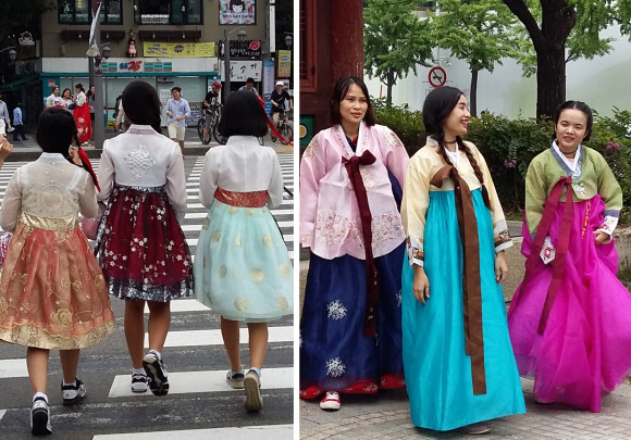 개량한복과 정통한복을 입은 관광객들이 서울 인사동 주변을 거닐고 있다. 연합뉴스