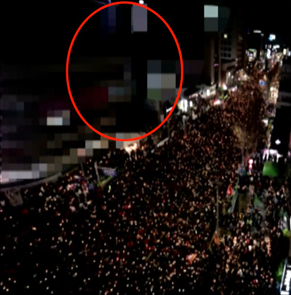 北TV, 촛불집회 보도하며 고층건물 등 모자이크 처리