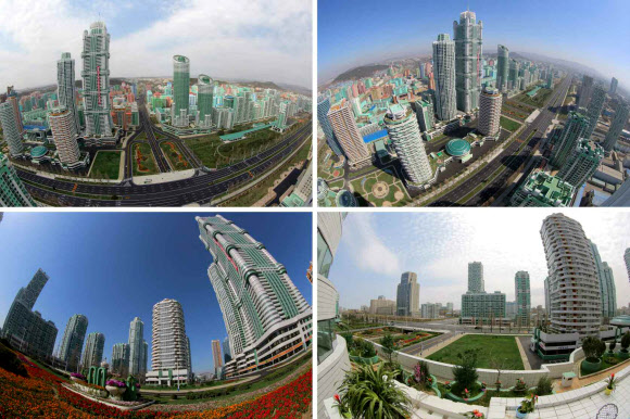 북한이 지난 13일 김정은 노동당 위원장이 참석한 가운데 여명거리 준공식을 했다고 노동신문이 14일 보도했다. 여명거리는 부지면적이 90여 정보(89만여 ㎡)이고, 연건축면적이 172만 8천여㎡에 달하며 초고층 빌딩이 즐비하게 들어서 평양의 스카이라인을 바꿀 신도시에 해당한다.  연합뉴스