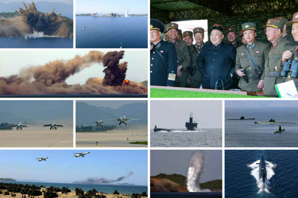 북한군은 지난 25일 김정은 북한 노동당 위원장이 참관한 가운데 창건 사상 최대 규모로 군종합동타격시위를 진행했다고 노동신문이 26일 보도했다. 사진은 군종합동타격시위에 참가한 화력부대들의 타격훈련 모습.  연합뉴스