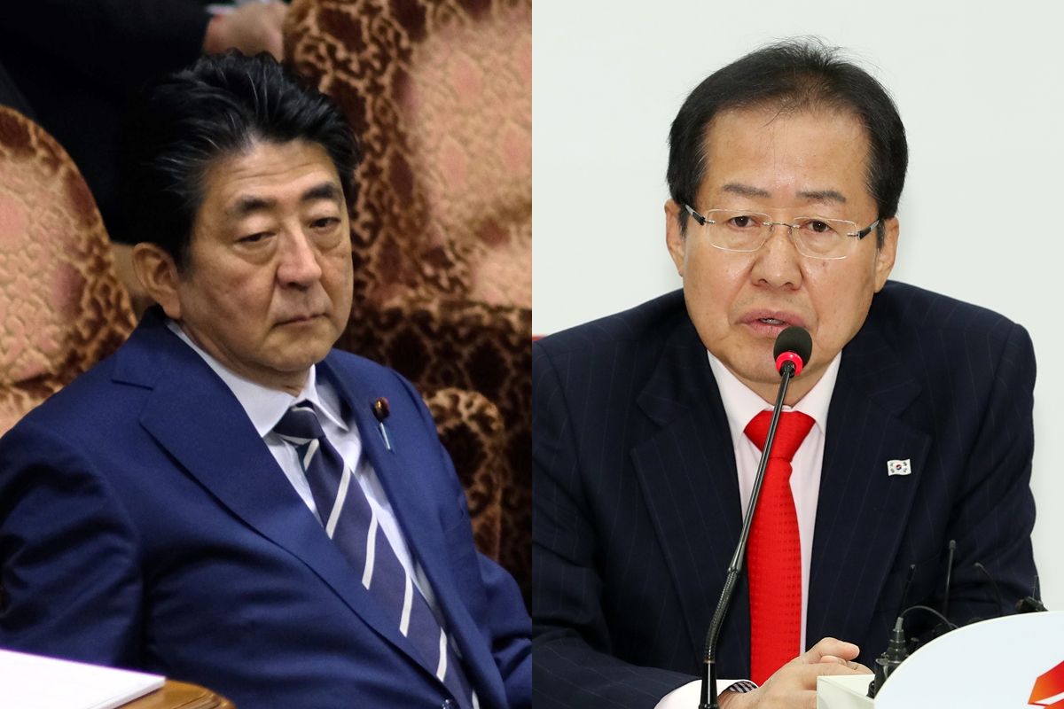 아베 신조 일본 총리와 홍준표 자유한국당 대표  AFP 연합뉴스 / 연합뉴스