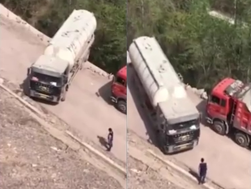 산 중턱 폭이 매우 좁은 도로에서 유턴을 시도하는 트럭 모습(유튜브 영상 캡처)