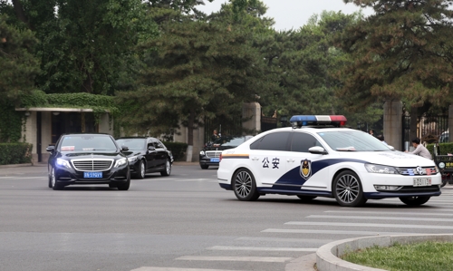 조어대 빠져 나가는 북한 노동당 참관단 연합뉴스