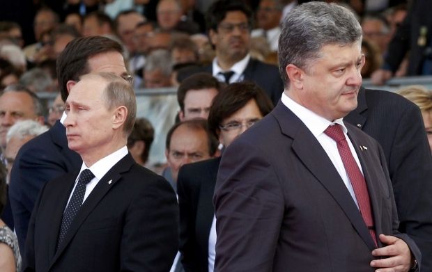 블라디미르 푸틴(왼쪽) 러시아 대통령과 페트로 포로셴코(오른쪽) 우크라이나 대통령. 2018.11.30. 로이터 연합뉴스