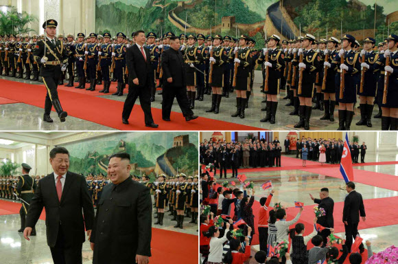 북한 노동당 기관지 노동신문이 김정은 국무위원장의 방중 소식을 10일자 지면에 사진과 함께 보도했다. 김 위원장이 시진핑(習近平)  중국 국가 주석과 8일 중국 인민대회당에서 인민해방군의 사열을 받는 모습. 2019.1.10  연합뉴스