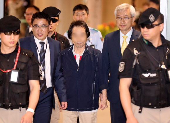 삼엄한 경호속에 귀국하는 리비아 피랍 한국인