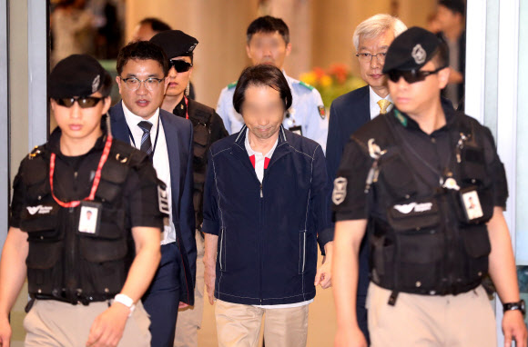 삼엄한 경호속에 귀국하는 리비아 피랍 한국인