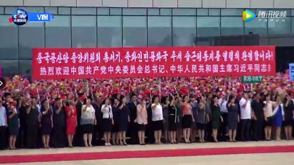 평양 시내의 시진핑 중국 국가주석 환영 인파