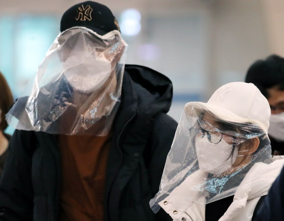 비닐 쓴 중국인 관광객