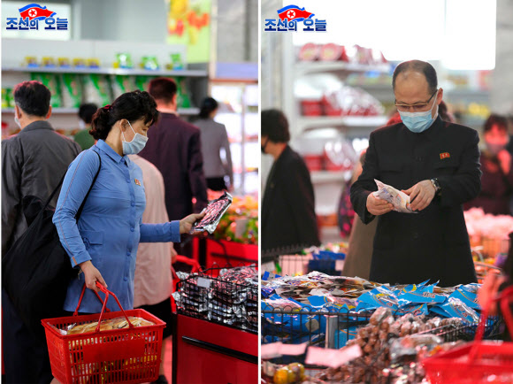 북한 대외선전매체 ‘조선의 오늘’은 29일 쇼핑객들로 붐비는 평양 제1백화점의 모습을 공개했다. 1층 식료품매대와 2층 가방매대 등에서 마스크를 쓴 채 물건을 살피고 고르는 사람들의 모습이 사진에 담겼다. 2020.5.29.  조선의 오늘 캡처