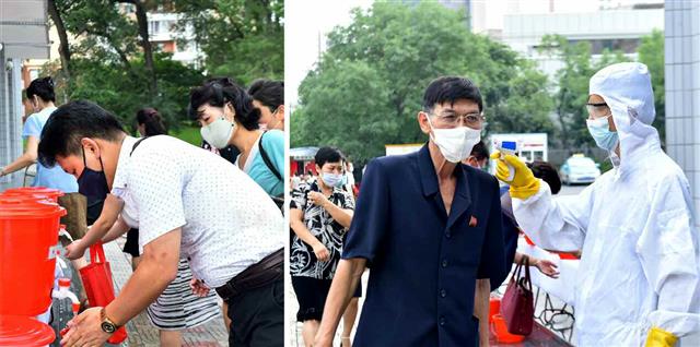 북한 노동당 기관지 노동신문은 22일 신종 코로나바이러스 감염증(코로나19)에 ‘최대비상체제’를 유지 중인 평양시의 모습을 공개했다. 신문은 “체온 재기와 손 소독을 비상방역 규정에 맞게 엄격히 진행하여 사소한 비정상적인 현상도 나타나지 않게 하고 있다”라고 전했다.  평양 노동신문=뉴스1