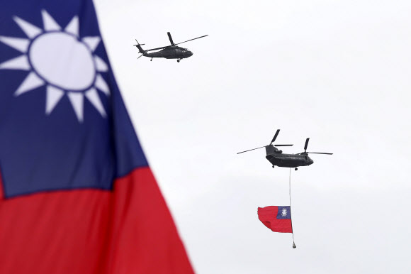 Helicopters fly over President