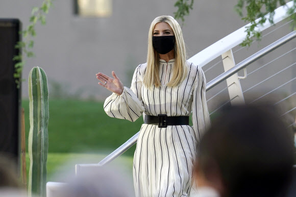 Ivanka Trump, daughter and adviser to President Donald Trump, waves to supporters as she arrives at a campaign event, Sunday, Oct. 11, 2020, in Paradise Valley, Ariz. (AP Photo/Ross D. Franklin)