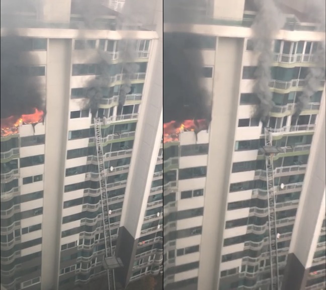 1일 경기 군포시 산본동의 한 아파트 12층에서 화재가 발생했다. 사진은 화재 사고 현장에서 사람이 구조되는 모습. 사진=독자 제공