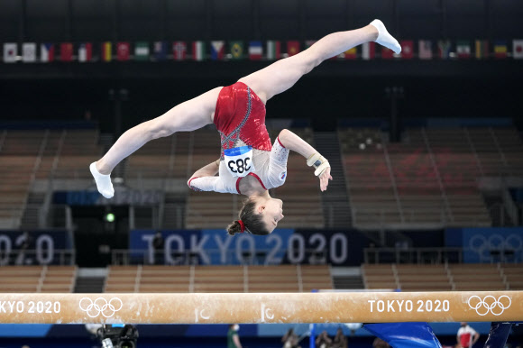 Vladislava Urazova, of the Russian Olympic Committee, performs on the balance beam during the women‘s artistic gymnastic qualifications at the 2020 Summer Olympics, Sunday, July 25, 2021, in Tokyo. (AP Photo/Natacha Pisarenko)