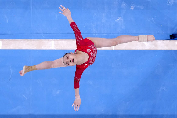 Lu Yufei, of China,performs on the beam during women‘s artistic gymnastic qualifications at the 2020 Summer Olympics, Sunday, July 25, 2021, in Tokyo. (AP Photo/Morry Gash)