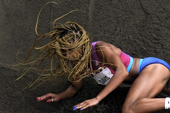 Tara Davis, of United States, competes during the finals of the women‘s long jump at the 2020 Summer Olympics, Tuesday, Aug. 3, 2021, in Tokyo. (AP Photo/Morry Gash)