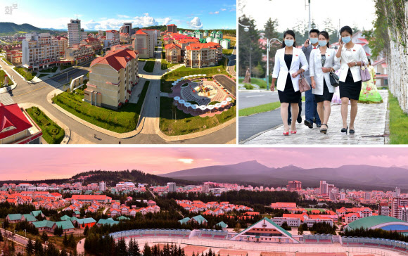 북한의 대외홍보용 월간 화보 ‘조선’은 ‘이상적인 본보기 지방 도시’로 개발한 양강도 삼지연시의 모습을 게재했다. 김정은 국무위원장은 집권 초인 2013년 김일성 주석의 ‘혁명활동 성지’이자 김정일이 태어났다고 선전하는 ‘백두산 밀영(密營)’이 자리잡은 삼지연을 ‘백두산 혁명사적지’로 조성하라고 지시한 이후 2019년까지 9차례나 현지지도 등 공개활동을 벌였다. 삼지연은 원래 군(郡)이었지만, 김 위원장이 참석한 2019년 읍지구 준공식 직후 시(市)로 승격했다. 사진은 시내 전경과 주민들의 모습. 2021.9.7  북한 대외용 화보 ‘조선’ 9월호 캡처
