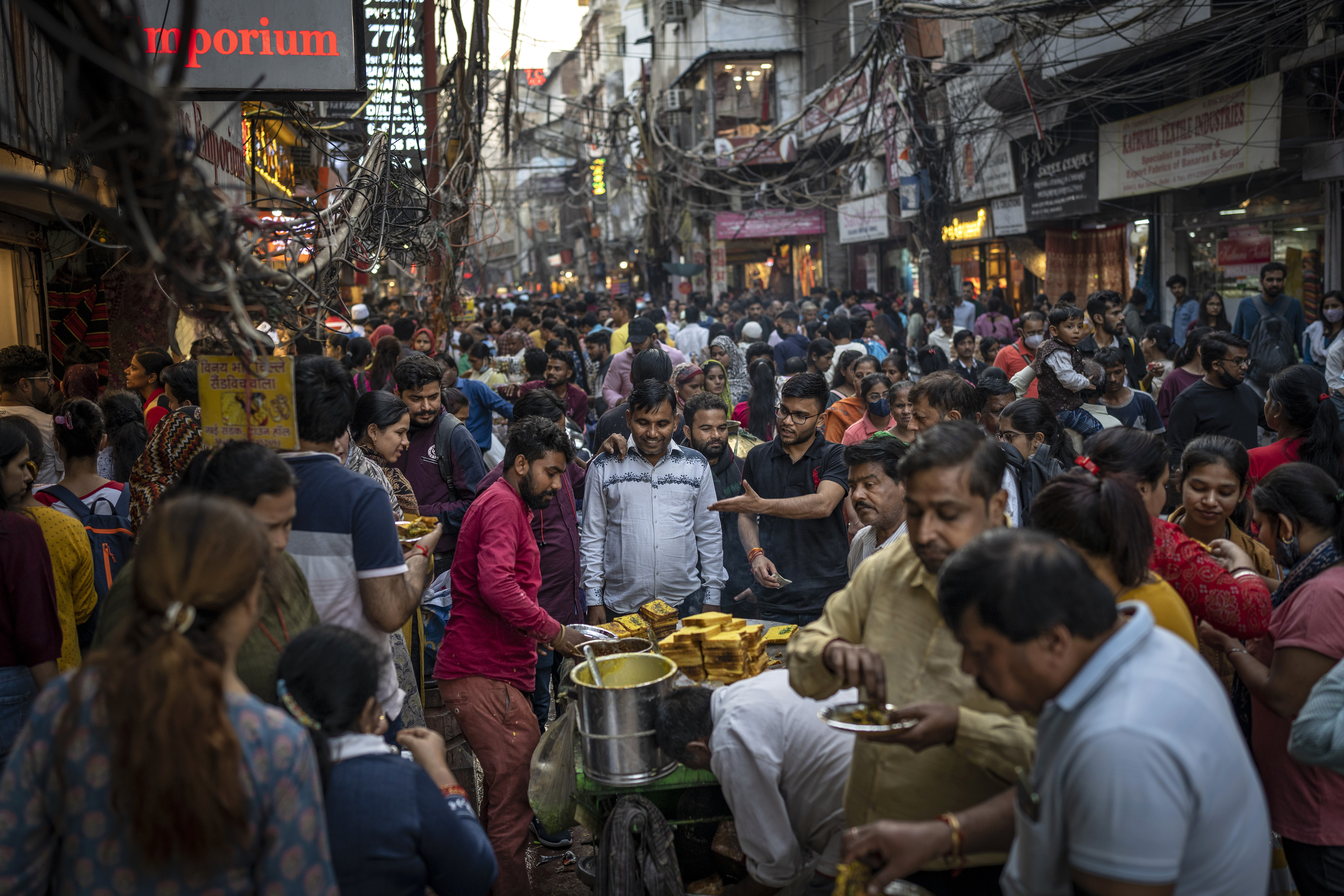 People eat street food as shop