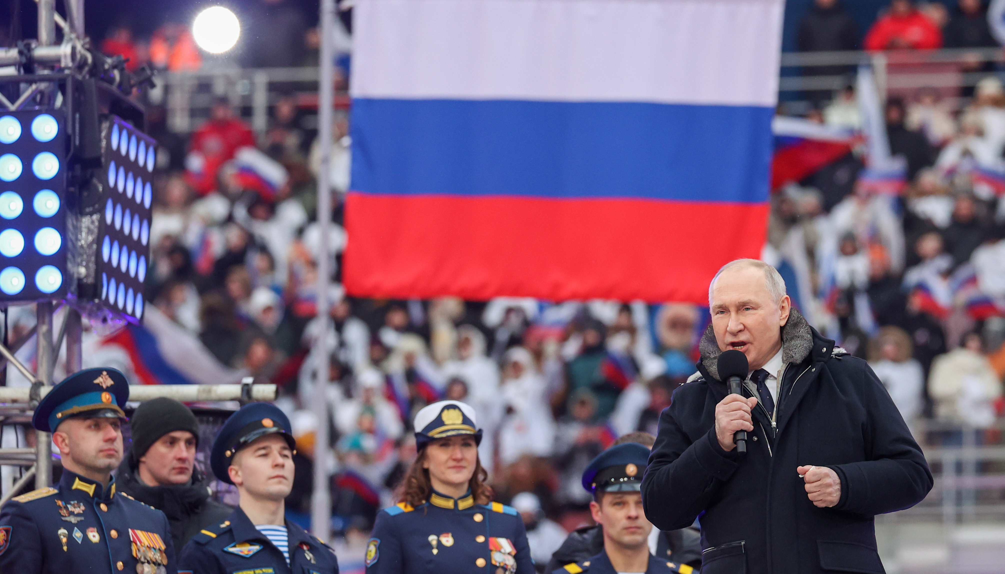 RUSSIA, MOSCOW - FEBRUARY 22, 2023: Russia‘s President Vladimir Putin (R) addresses an open-air concert and rally titled “Glory to Defenders of Our Fatherland” in Luzhniki, on the eve of Russia’s Defender of the Fatherland Day. Sergei Bobylev/TASS