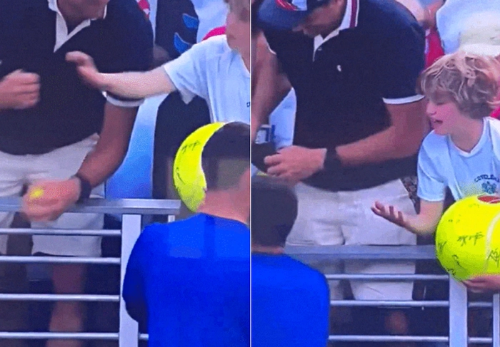 지난 28일(현지시간) 미국 뉴욕에서 열린 US오픈에서 폴란드 테니스 스타 카밀 마이흐르작(아래)이 한 어린이 팬에게 모자를 건네자 옆에 서 있던 남성이 이를 낚아채고 있다. 엑스(X·옛 트위터) 캡처