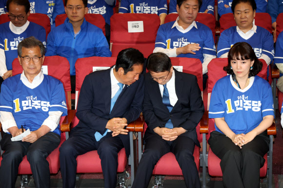 출구조사 결과에 신중한 민주당