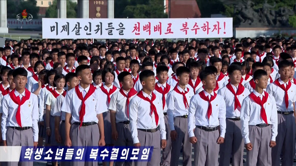 북한이 지난 23일 ‘6.25미제반대투쟁의 날’을 맞아 조국해방전쟁승리기념관 교양마당에서 학생소년들의 복수결의모임을 열었다고 조선중앙TV가 24일 보도했다. 2026.6.25. 연합뉴스