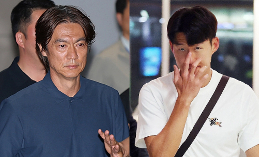 홍명보 감독과 따로 귀국길 오른 손흥민 “다시 뛰겠다”  2026 북중미 월드컵 32강 진출 실패의 책임을 지고 사퇴 의사를 밝힌 홍명보 축구대표팀 감독. 오른쪽은 축구국가대표팀 손흥민이 29일(현지시간) 미국 로스앤젤레스 국제공항에서 귀국하는 비행기에 오르고 있는 모습. 2026.6.30 뉴스1