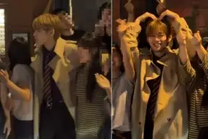 thumbnail - BTS 뷔, 파리서 女에 팔 올린 모습 포착…‘하트’ 만들기도