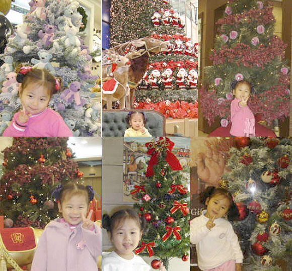 성탄절 트리를 좋아하는 우리 딸. 사진 찍어 달라 성홥니다. (박진백·전남 순천시 장천동)