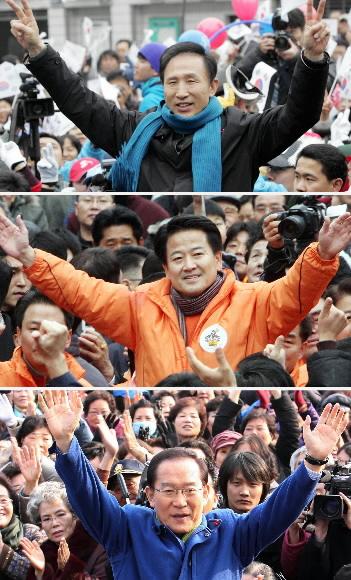 19일 치러지는 제17대 대통령 선거의 최종 승자는 누가 될 것인가. 선거를 하루 앞둔 18일 한나라당 이명박 후보와 대통합민주신당 정동영 후보, 무소속 이회창 후보가 각각 서울 도심에서 가진 마지막 유세에서 두 팔을 높이 쳐들며 대선 승리를 다짐하고 있다. 최해국 김명국 이호정기자 seaworld@seoul.co.kr