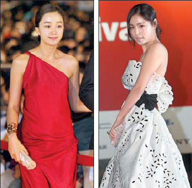 부산영화제가 9일간의 잔치를 끝내고 15일 폐막했다. 빨간 드레스 금기를 깬 수애(왼쪽)와 토종 드레스를 선택한 민효린.