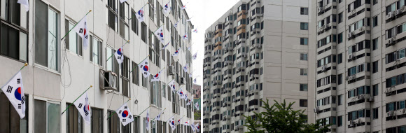 현충일인 6일 충북 충주시 주덕읍 신양리 신양아파트(왼쪽)에는 태극기가 물결을 이루고 있는 반면, 서울 여의도 시범아파트에는 게양된 태극기를 찾아볼 수 없다.  연합뉴스