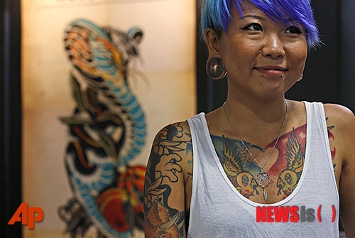 제1회 국제홍콩차이나 문신대회가 지난 4일부터 6일까지 열렸다. 전세계에서 내노라하는 문신 아티스트들이 대회에 참가했다.<br>AP/뉴시스
