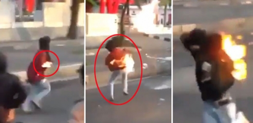 화염병 던지려다 자신의 옷에 불붙은 남자