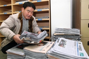 보름마다 신문 들고 고물상 가는 공무원