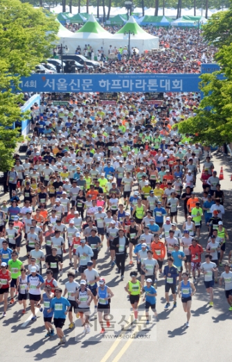 [서울신문 하프마라톤] 걱정 날리고, 활력 살리고… 1만명 숨어 있던 질주 본능 뽐내다