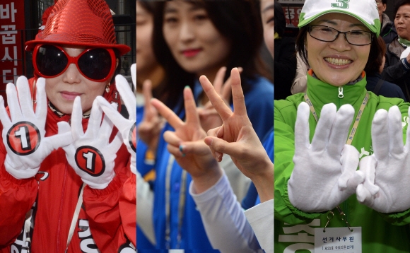 4.13 총선 공식선거운동 첫 날인 31일 각 정당의 후보 유세에서 선거 운동원이 기호를 나타내는 손을 보이며 지지를 호소하고 있다.  이종원 선임기자 jongwon@seoul.co.kr