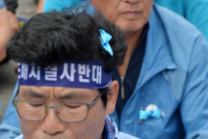 [서울포토] ‘외부인 차단’ 명찰·리본 달고…성주군 사드배치 철회 요구 집회